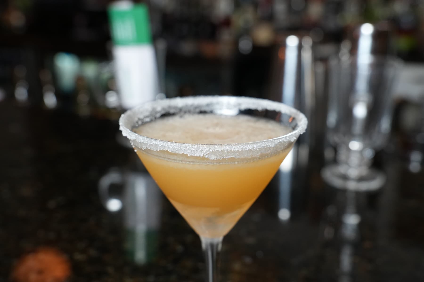 Sugar-rimmed citrus cocktail served up in a martini glass